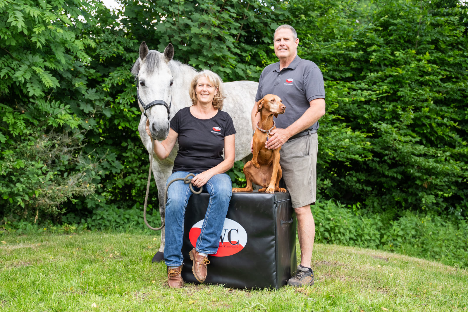 IAVC founders Dr. Sybil and Dr. Donald Moffatt with a horse and dog